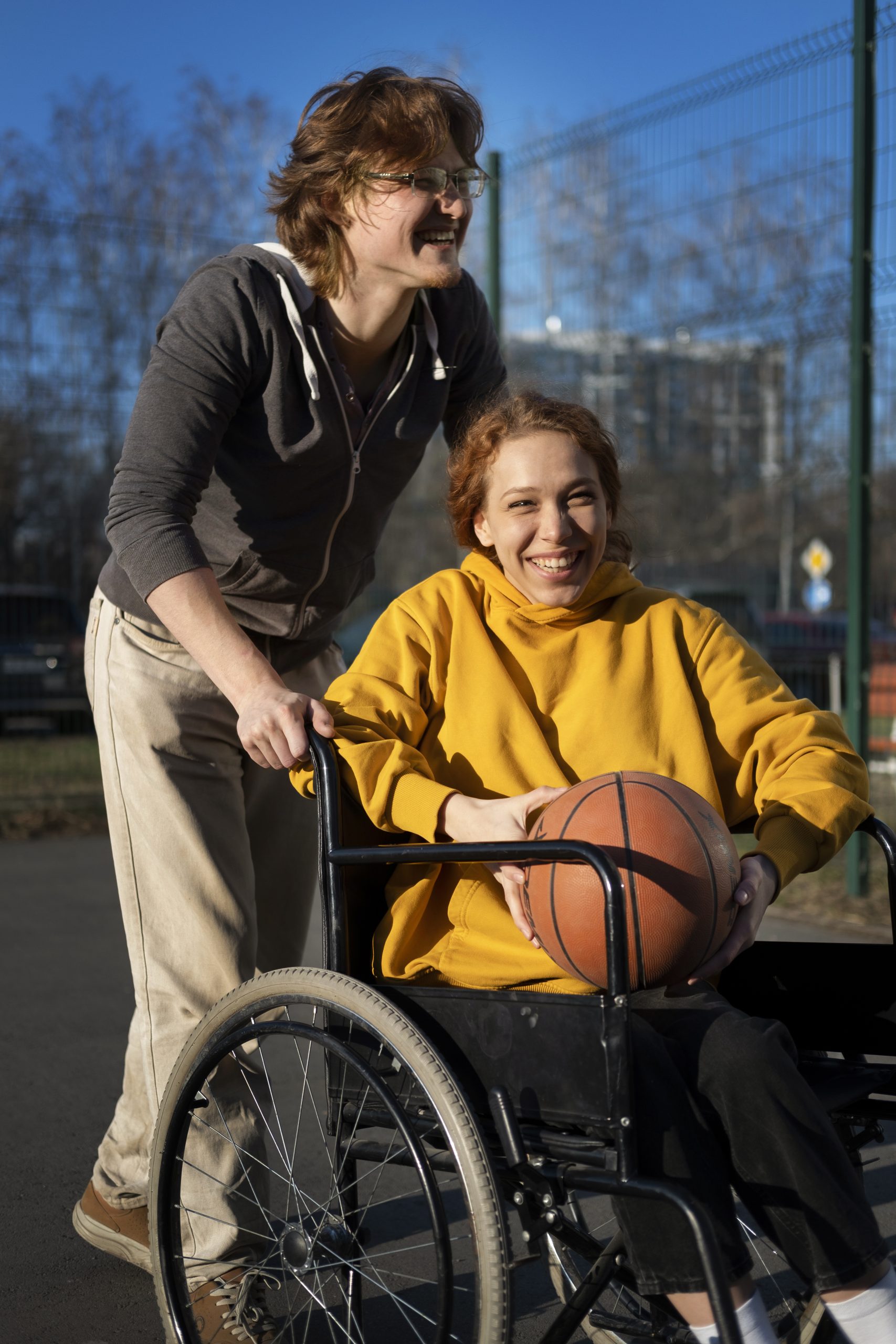 full-shot-happy-friends-playing-basketball
